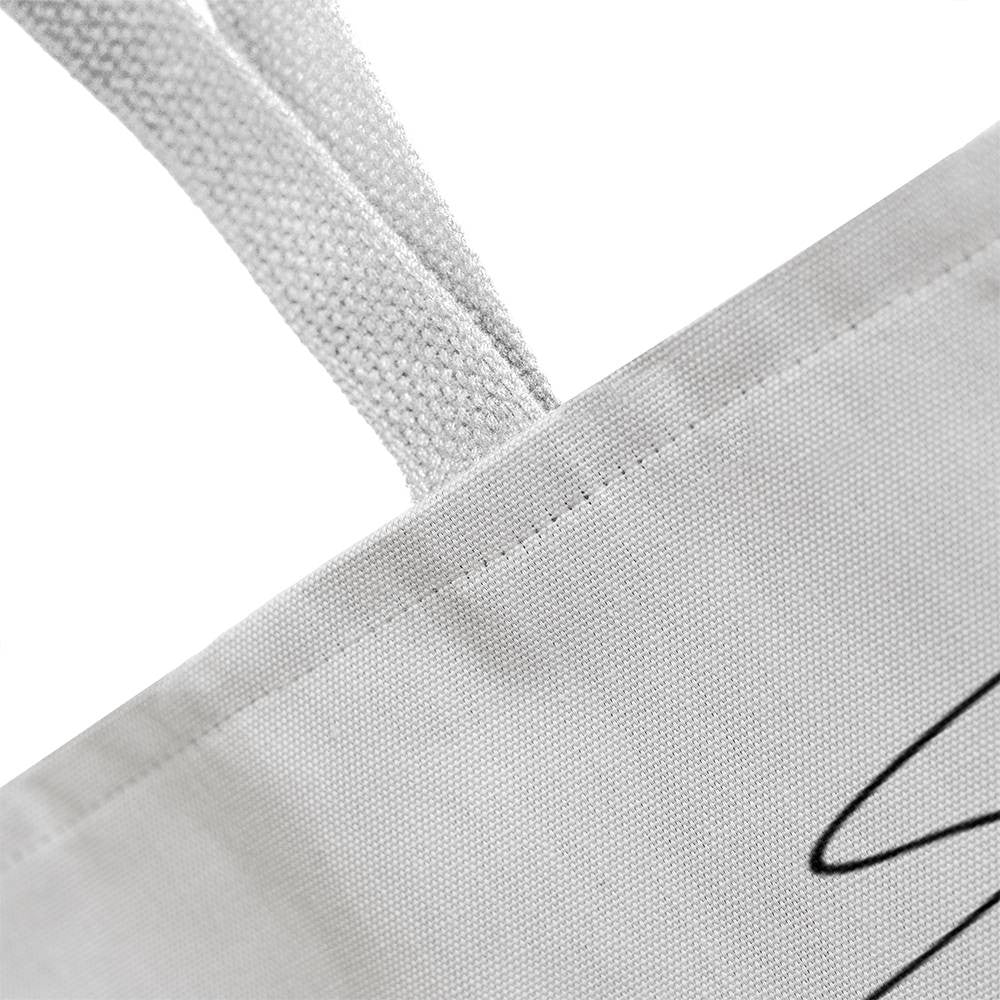 Close up of the handle and stitching on F1 tote back