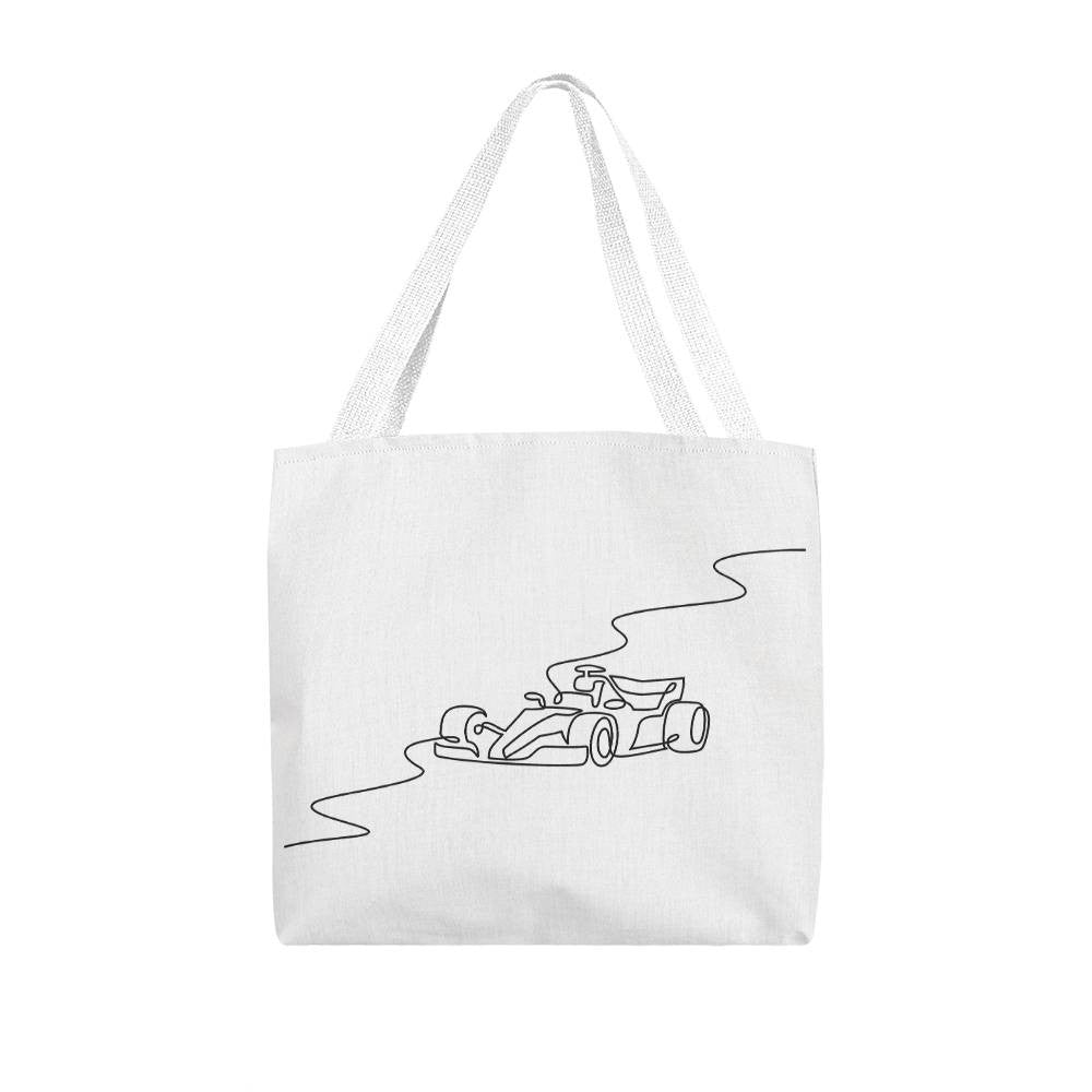 White canvas fan inspired F1 merch featuring white handles and black illustrated circuit and race car