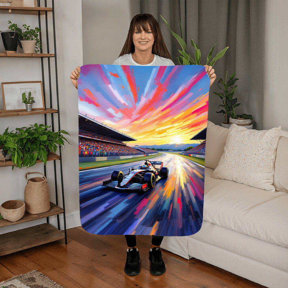 Woman holding an F1 fan merch blanket featuring a race car on the track at sunshet